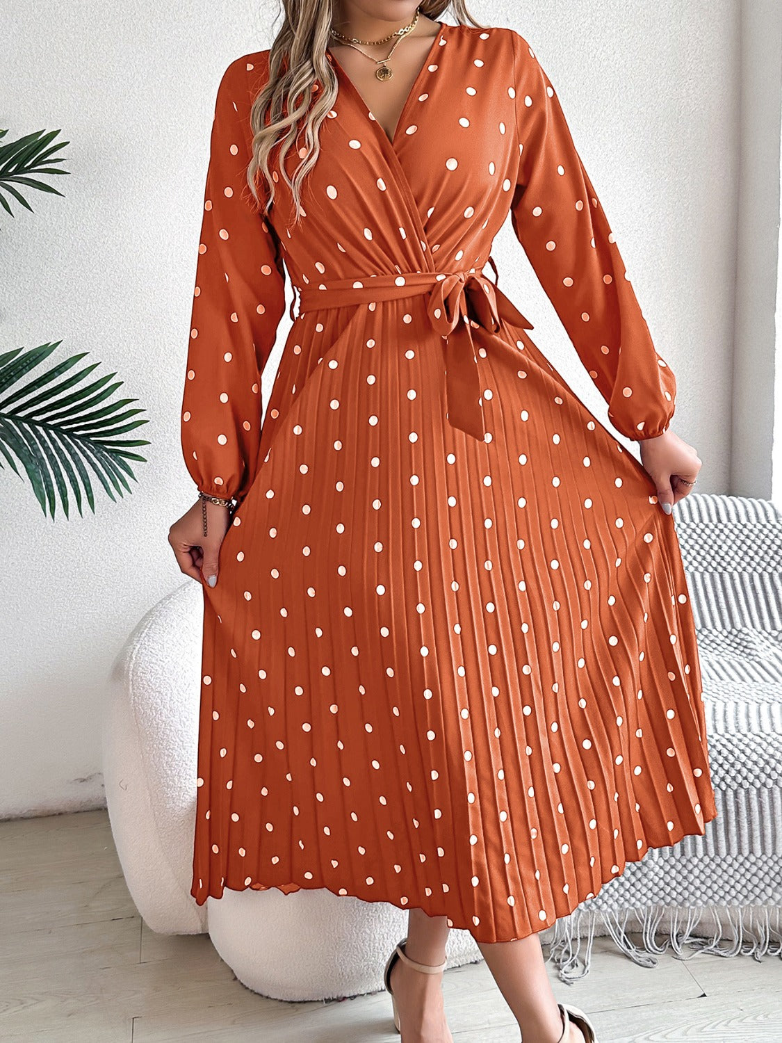 PERLA | Gestrikte polka dot midi-jurk met lange mouwen