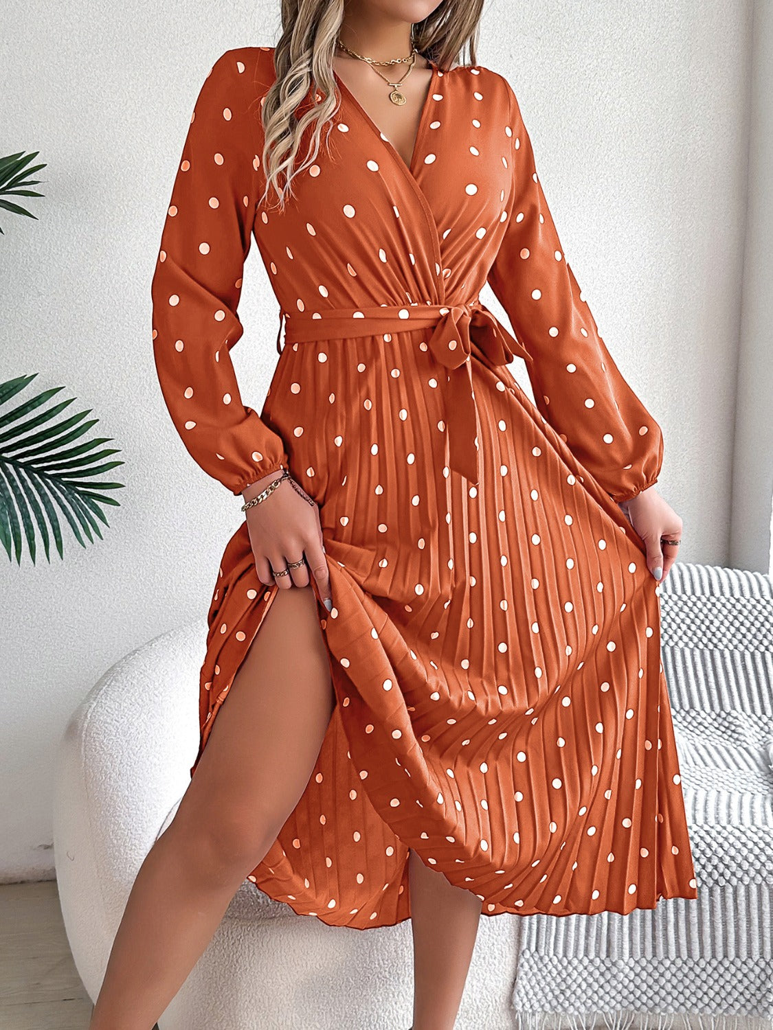 PERLA | Gestrikte polka dot midi-jurk met lange mouwen